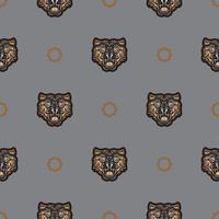 Seamless pattern with tiger face in colored Polynesian style. Good for clothing and textiles. Vector illustration.