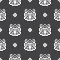 Polynesian style tiger face seamless pattern. Boho tiger face. Good for clothing and textiles. Vector