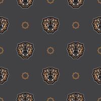 Seamless pattern with tiger face in colored boho style. Polynesian style tiger face. Good for backgrounds, prints, apparel and textiles. Vector illustration.