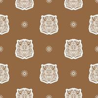 Seamless pattern with a lion's head in a simple style. Good covers, fabrics and printing. vector