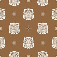 Seamless pattern with a lion's head in a simple style. Good covers, fabrics and printing. Vector