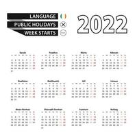 Calendar 2022 in Irish language, week starts on Monday. vector