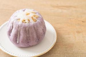 taro bun with white sugar cream and nut photo