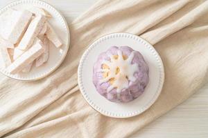 taro bun with white sugar cream and nut photo