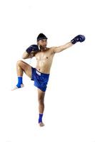 Thai boxer with thai boxing action, isolated on white background photo