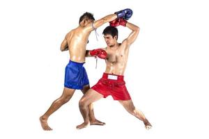 Two thai boxers exercising traditional martial art, Isolated on white background photo