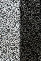 New asphalt texture with white dashed line. photo