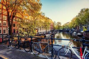 Bicycles Parked Along a Bridge Over the Canals of Amsterdam, Net photo