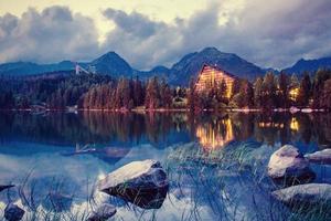 Majestic mountain lake in National Park High Tatra. Strbske ples photo