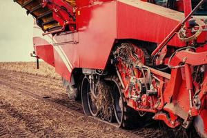 Tractor ploughing up the field. photo