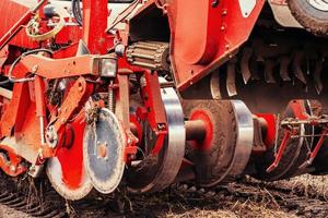 Tractor ploughing up the field. photo