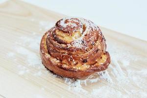 Cinnamon roll swirl bun with coconut photo