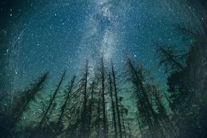 fantastic winter meteor shower and the snow-capped mountains. photo