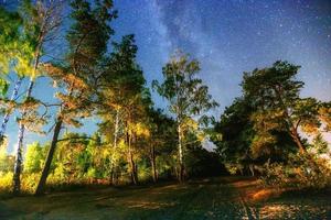 fantastic winter meteor shower and the snow-capped mountains. photo