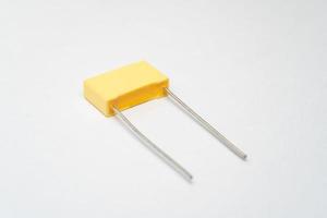 Isolated capacitor, used in electronic device. Electronic parts concept. photo