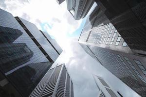 View of modern business skyscrapers glass and sky view landscape of commercial building in central city photo