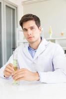 Health researcher, researcher working in a biological science lab, male research scientist photo