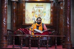 a man is praying hanumaan chalisha in temple photo