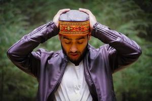 Sad Portrait himachali boy on the street in Himalayan photo