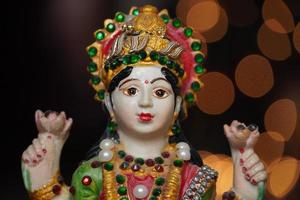 maa laxmi devi pooja image statue n diwali night photo