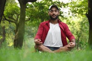 man doing yoga for anxiety photo