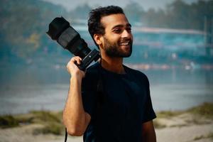 cameraman Taking a picture with a camera photo