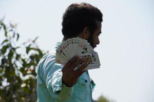 playing cards in hand with a man - Poker concept photo