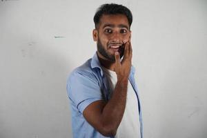 man smiling in front of camera photo