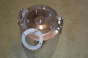 Moonshine still and parts for making distilled alcohol photo