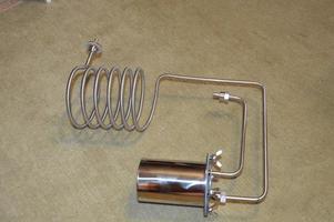 Moonshine still and parts for making distilled alcohol photo