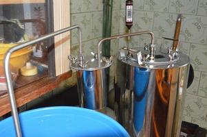 Moonshine still and parts for making distilled alcohol photo