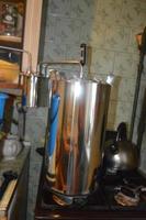 Moonshine still and parts for making distilled alcohol photo