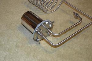 Moonshine still and parts for making distilled alcohol photo