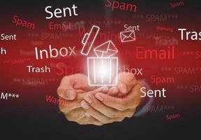 Email concept with laptop spam and virus computer monitor internet security concept, Businessman touch bin mail with a laptop. Spam, junk and e-marketing on screen, Spam Email Pop-up Warning. photo