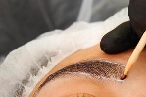 Eyebrow microblading procedure, salon photo