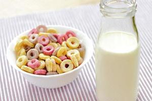Bowls with different sorts of breakfast cereal products, white bowls with morning meal photo