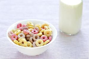 Bowls with different sorts of breakfast cereal products, white bowls with morning meal photo