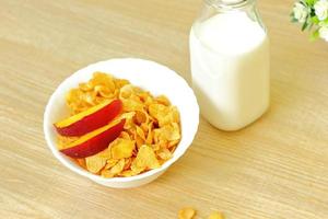 Bowls with different sorts of breakfast cereal products, white bowls with morning meal photo