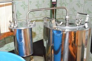 Moonshine still and parts for making distilled alcohol photo