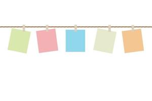 Blank papers colorful hanging on rope isolated on white background with copy space vector