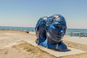 Cape Town South Africa 17. January 2018 Blue heads statue in Cape Town. Art of south Africa.