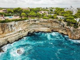 Panoramic drone shot of bay of Cala Santanyi, Mallorca, Spain. photo