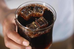 cold drinks and ice in a glass photo