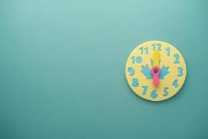 toy alarm clock on color background. photo