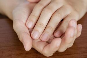 close-up-hands-of-a-woman-whose-nails-we