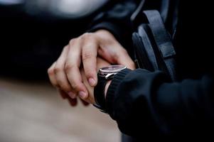 Gentlemen's hands and watches Like wearing a wristwatch And punctuality photo