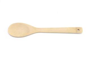 wooden spoon isolated on a white background photo