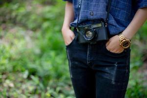 The woman and his beloved camera Travel concept photography photo