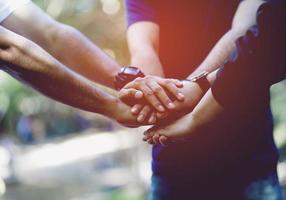 Teamwork and Unity Teamwork, handshaking in the team Team concept photo