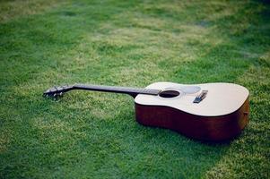 instrumento de guitarra de guitarristas profesionales concepto de instrumento musical para entretenimiento foto